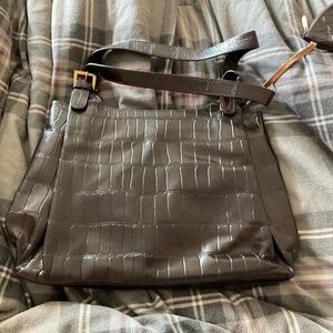 Big leather black purse with small pocket keychain attached